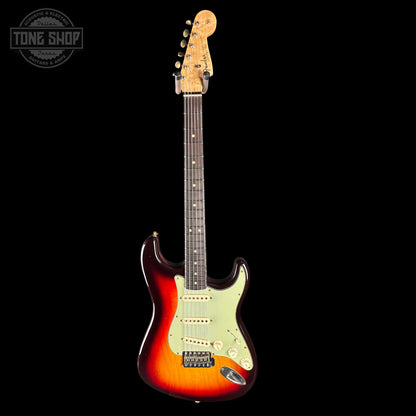Electric guitar with a sunburst finish on a black background, featuring the Tone Shop logo.