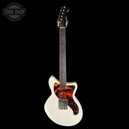 Electric guitar with a flame maple top on a black background, featuring the Tone Shop logo.