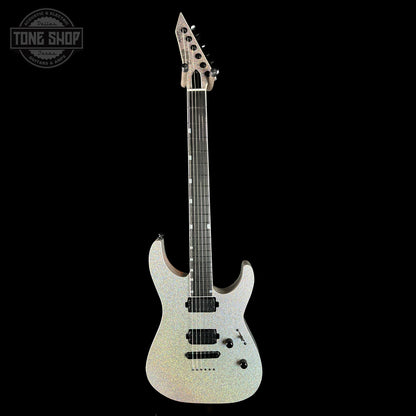 White electric guitar on a black background with 'Tone Shop' logo.