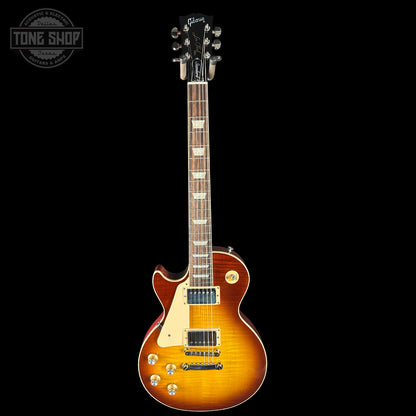 Electric guitar with a sunburst finish on a black background, featuring the Tone Shop logo.