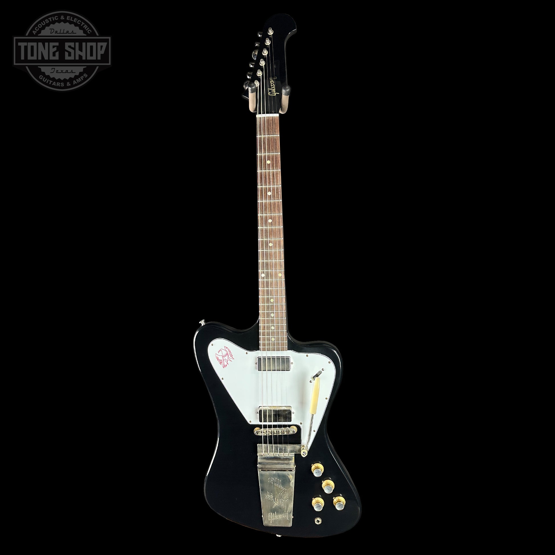 Gibson electric guitar with a black finish on a white background