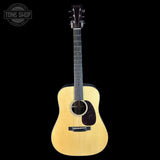 Acoustic guitar on a black background with 'Tone Shop' logo.