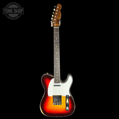 Electric guitar with a sunburst finish on a black background, featuring the Tone Shop logo.