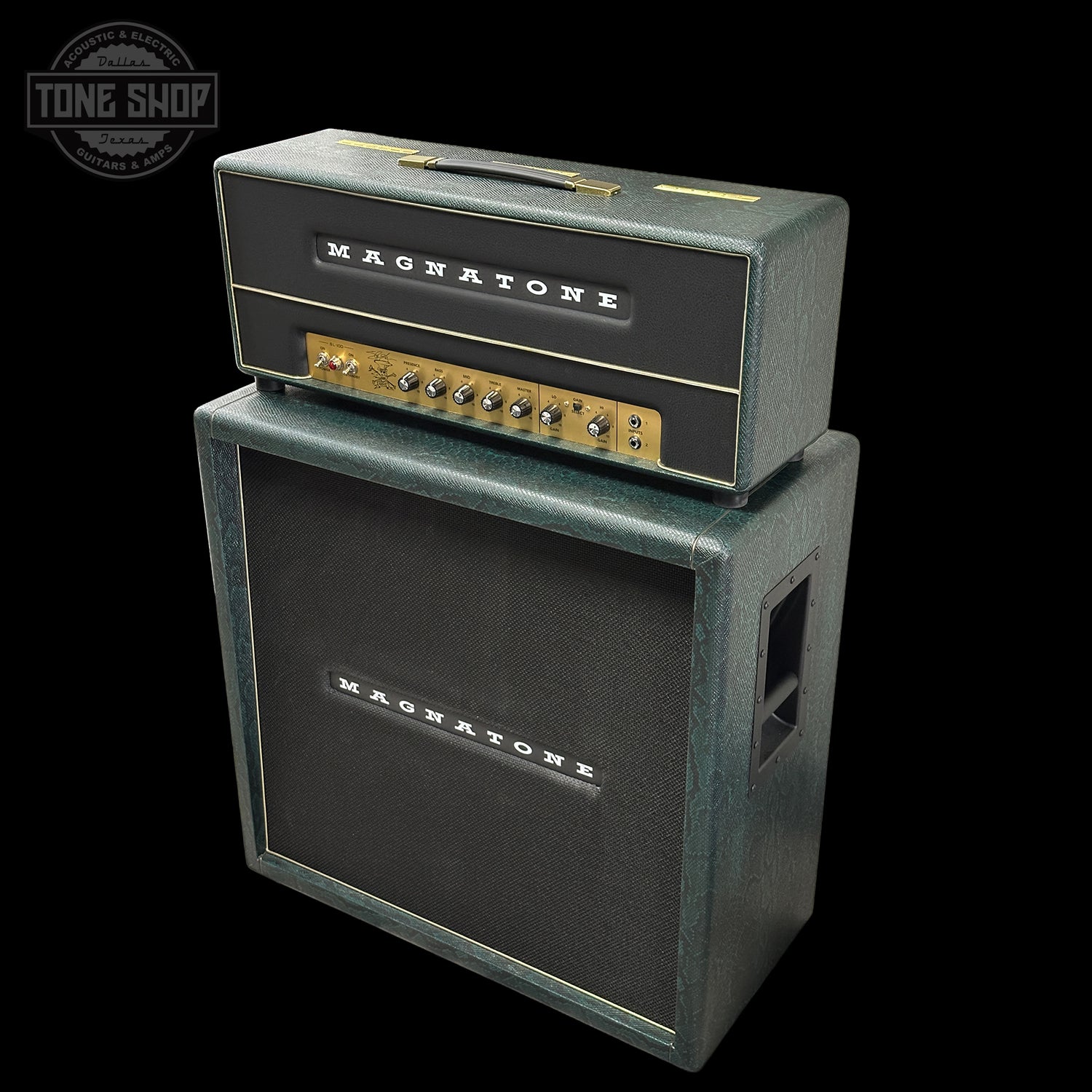 Magnatone guitar amplifier head and cabinet on a black background