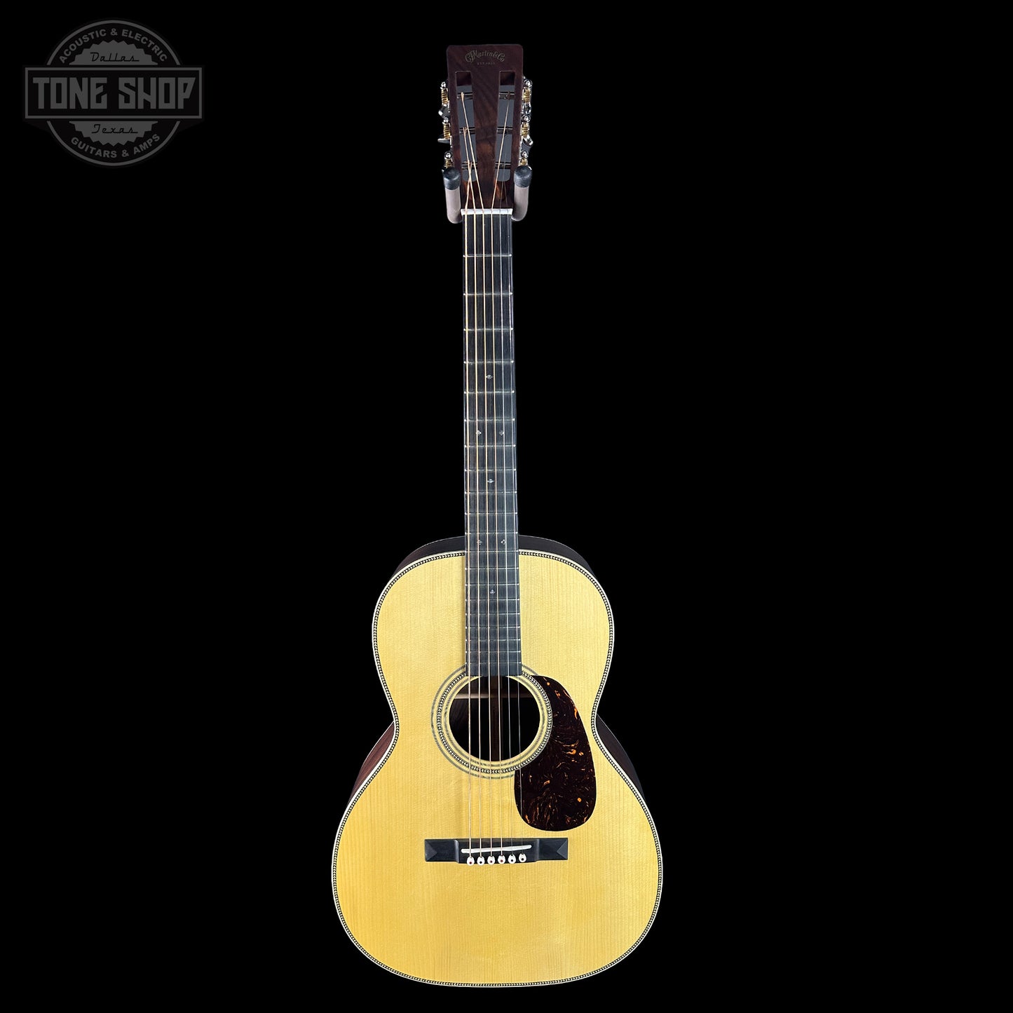 Full front of Martin Custom Shop 00-12 Fret Wild Grain East Indian Rosewood.