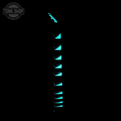 Glowing blue triangle patterns on a black background with 'Tone Shop' logo.