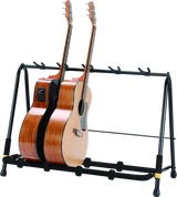 Front angle of Hercules GS525B 5 Guitar Rack with example guitars.