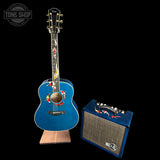 Front of Taylor 2025 Namm Custom #41 Grand Pacific Aquamarine Koi Motif w/case w/matching Circa 74 amp.