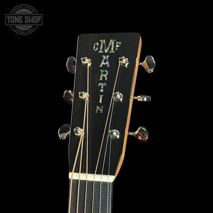 Headstock of Martin Custom Shop Dread 14-Fret Slope Shoulder Quilted Maple.