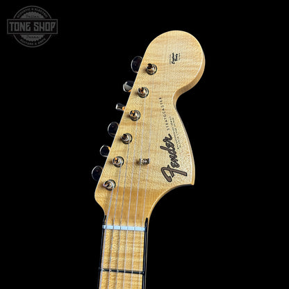 Fender guitar headstock on a black background