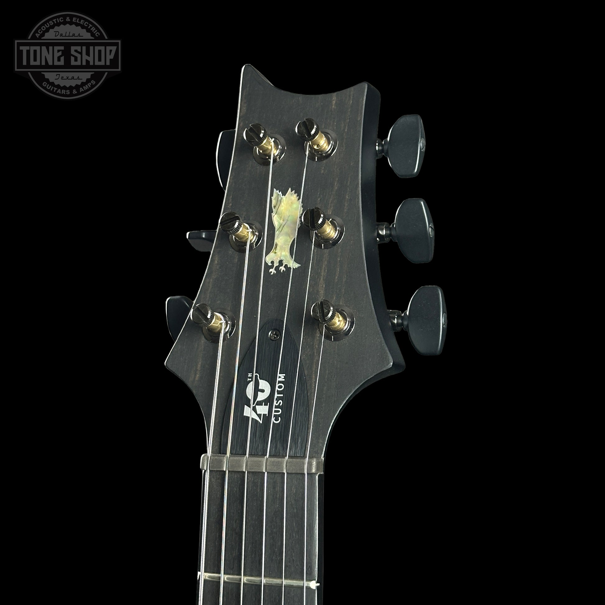 Headstock of PRS 40th Anniversary Custom 24 Satin Limited Charcoal Tri-Burst.