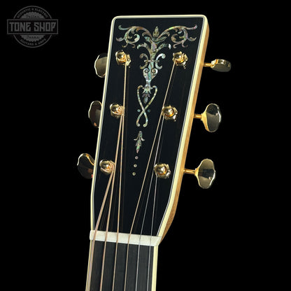 Headstock of Martin Custom Shop Dread 14-Fret Quilted Maple.