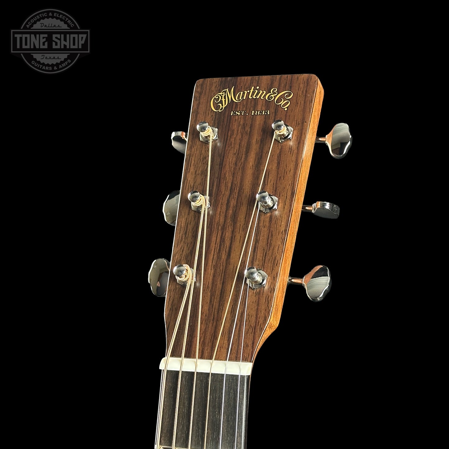 Headstock of Martin Custom Shop 000 14-Fret Jaguar Claw Mahogany.