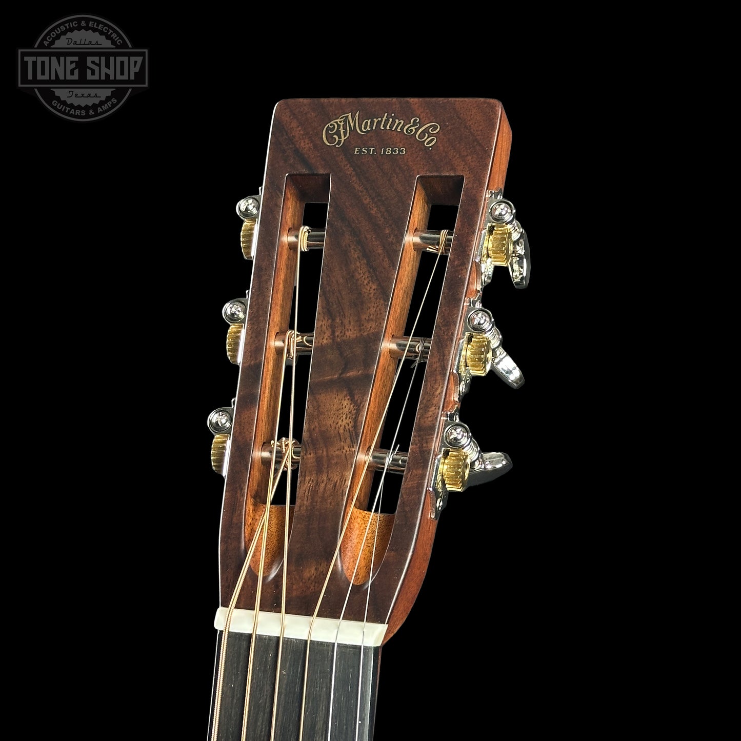 Headstock of Martin Custom Shop 00-12 Fret Wild Grain East Indian Rosewood.