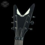 Guitar headstock with 'Dean' logo on a black background