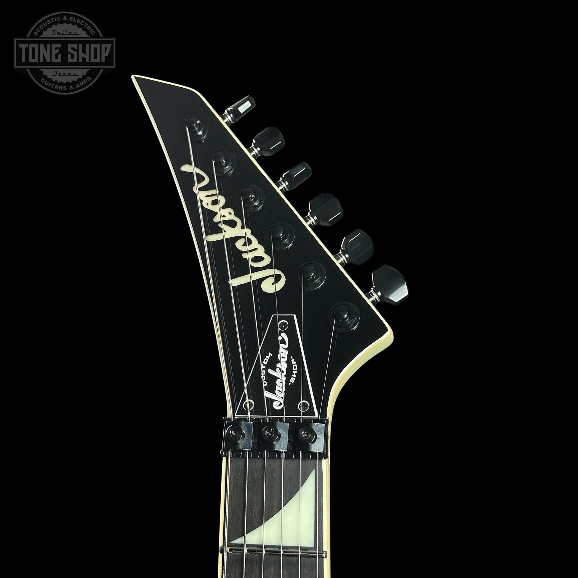 Headstock of Jackson Custom Shop TSG Illuminati SL2H FR Vanilla Shake.