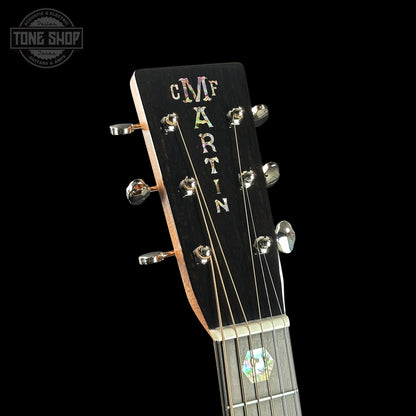 Guitar headstock with 'Martin' branding on a black background