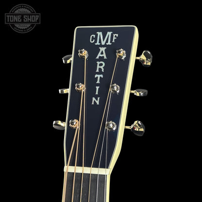 Guitar headstock with 'Martin' branding on a black background
