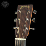 Guitar headstock with 'Martin & Co' branding on a black background