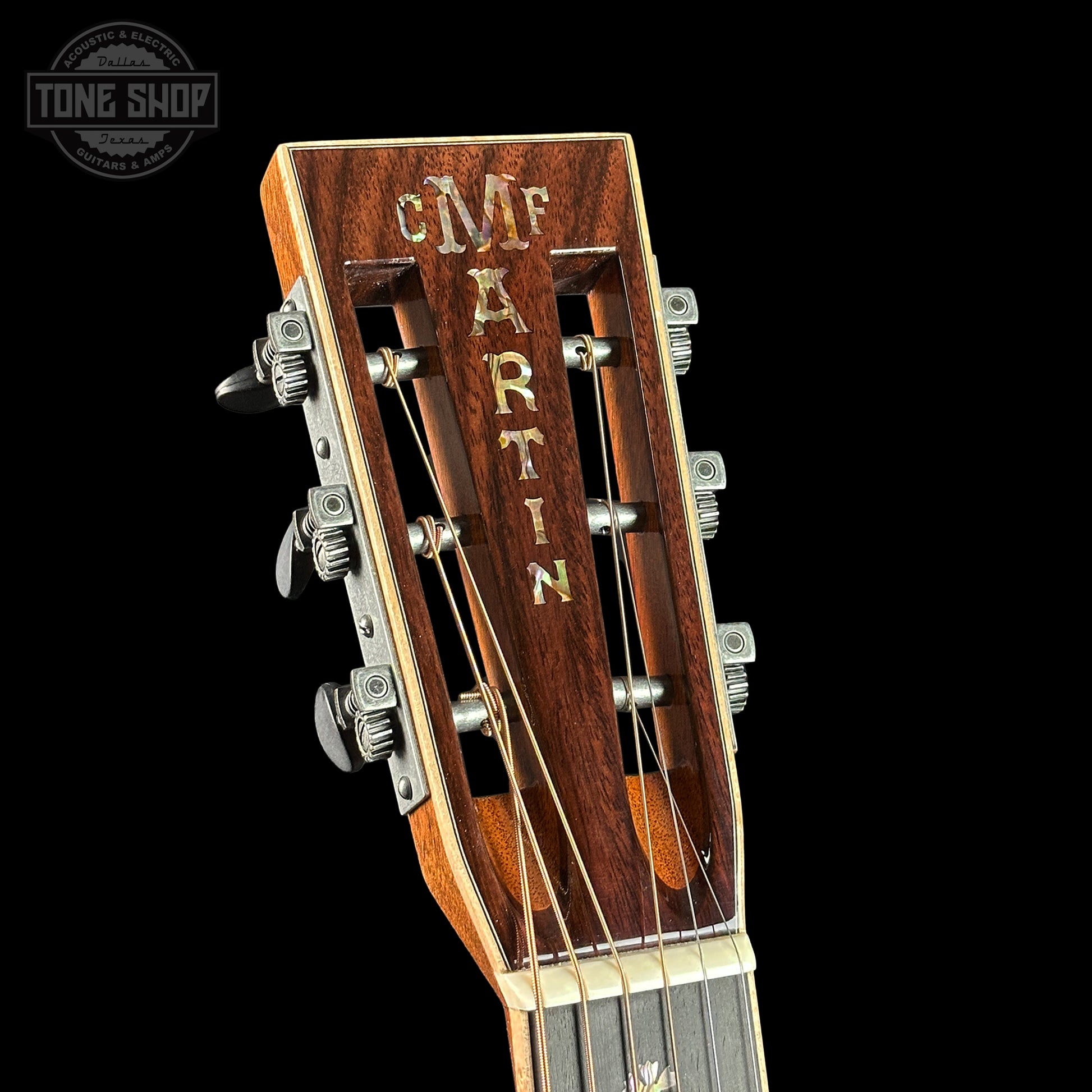 Headstock of Martin Custom Shop 00-12F 45 Style Adirondack/Wild Grain East Indian Rosewood.