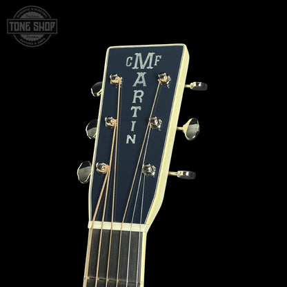 Guitar headstock with 'Martin' branding on a black background