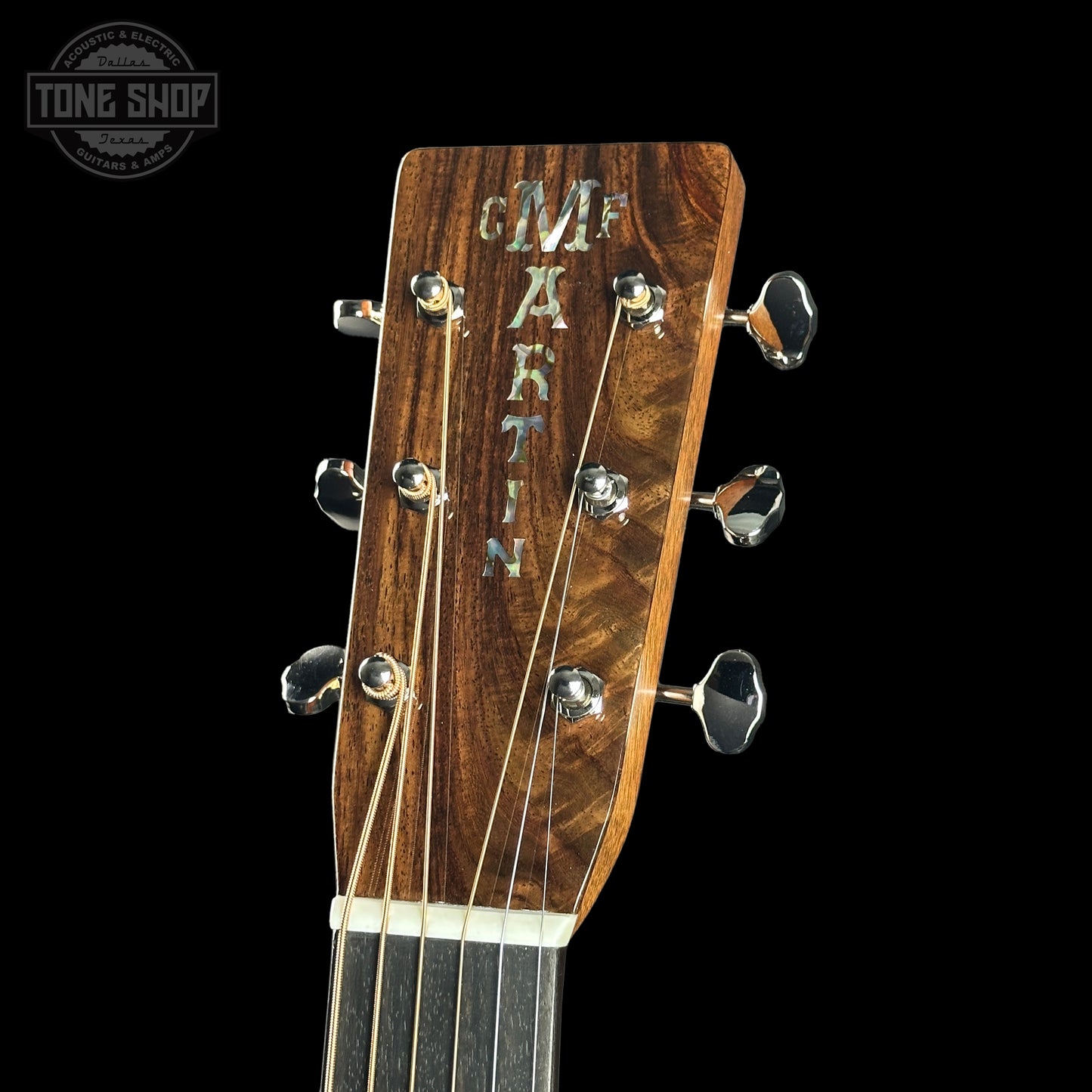Headstock of Martin Custom Shop Dread 14-Fret Wild Grain East Indian Rosewood.