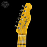 Fender Telecaster guitar headstock on a black background