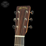 Guitar headstock with 'Martin & Co.' branding on a black background