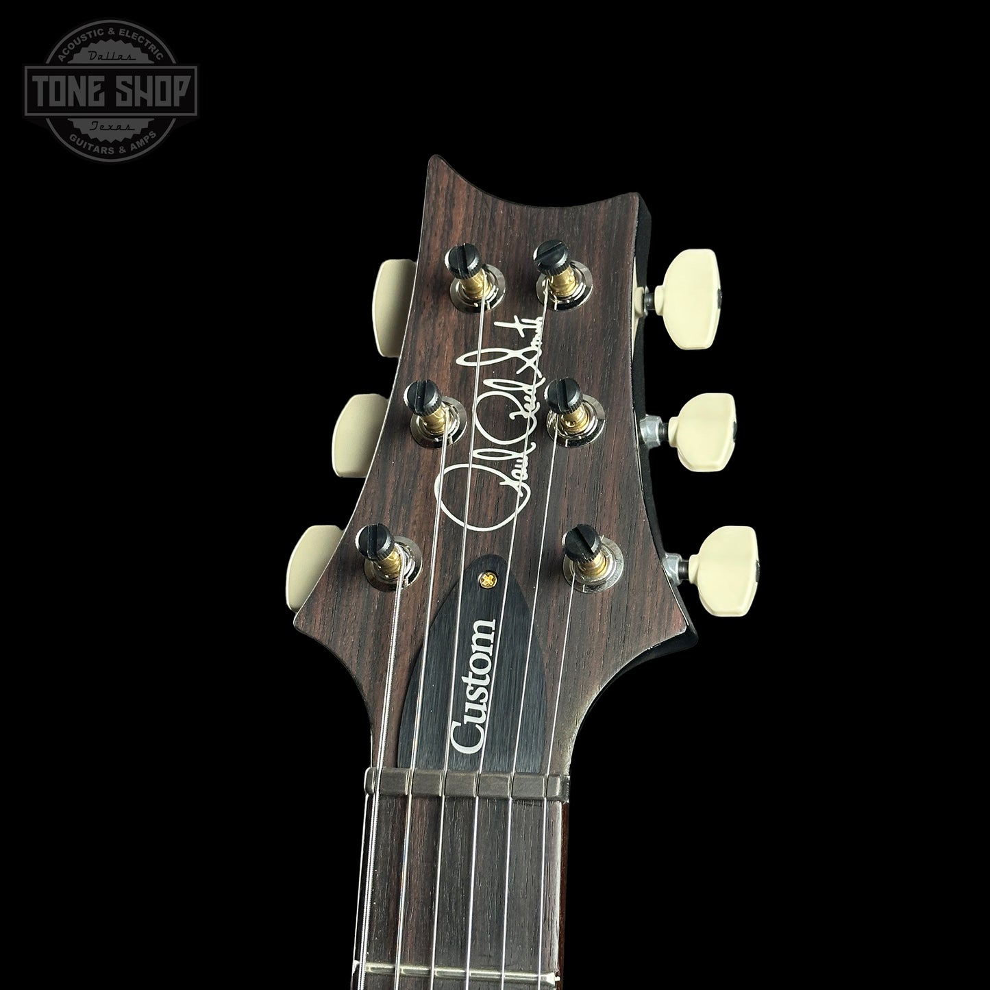 Headstock of PRS Custom 24 10 Top Purple Mist.
