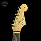 Fender Stratocaster guitar headstock on a black background with 'Tone Shop' logo.