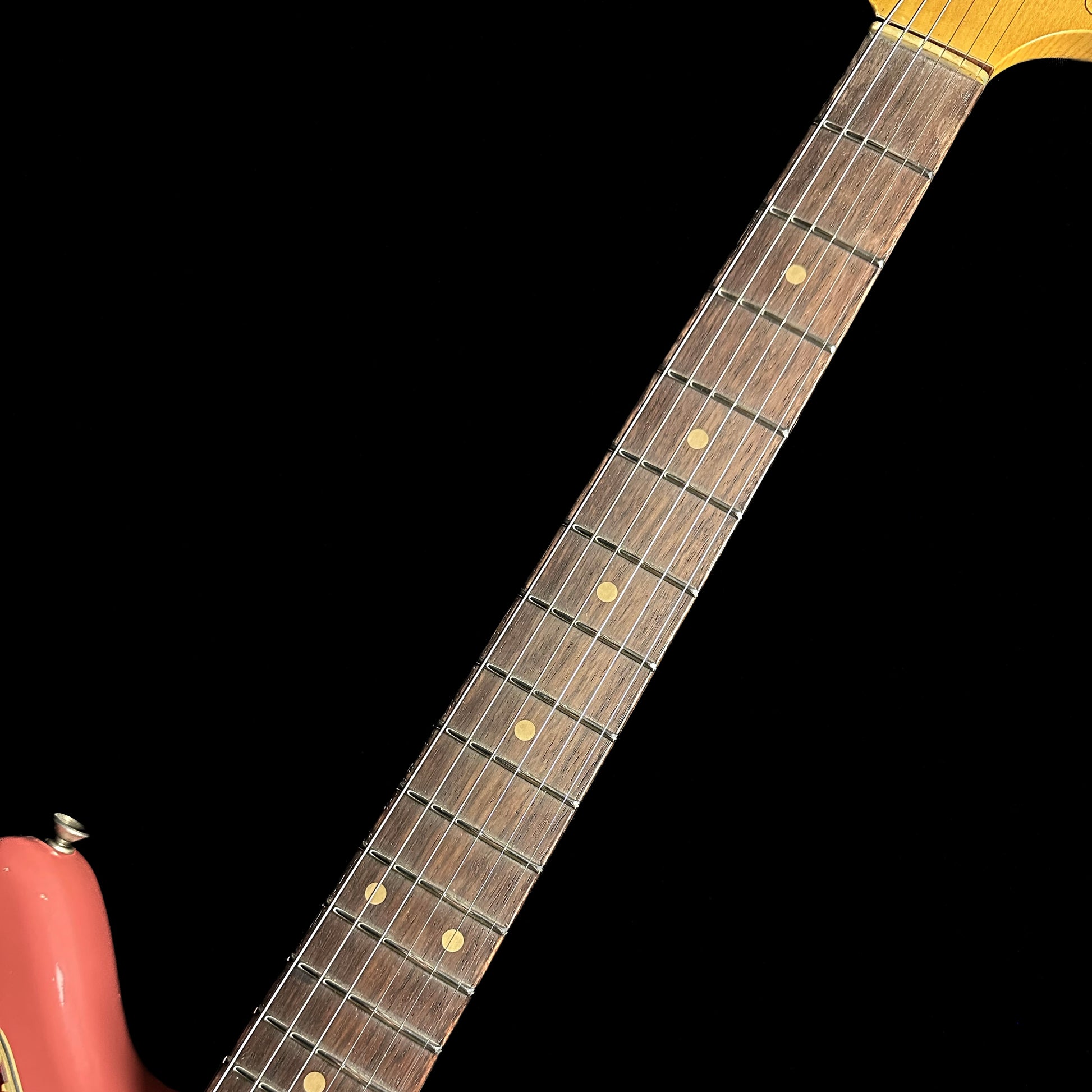 Neck of Fender Custom Shop 1962 Jazzmaster Journeyman Relic Super Faded Aged Fiesta Red.