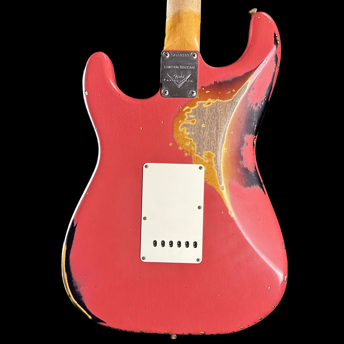 Back of Fender Custom Shop Limited 67 Stratocaster Heavy Relic Aged Fiesta Red/3-Tone Sunburst.