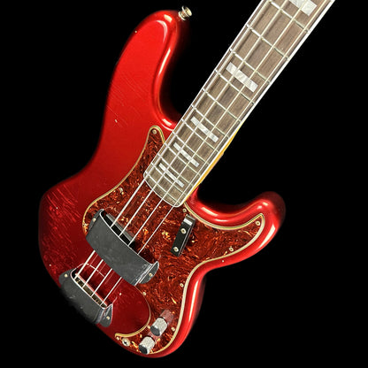 Front angle of Fender Custom Shop Limited P Jazz Bass Journeyman Aged Candy Apple Red.