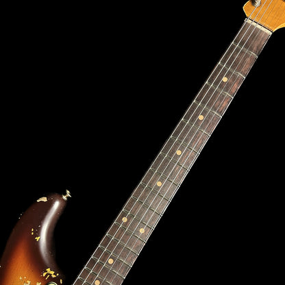 Closeup of Fender Custom Shop Limited Edition '59 Strat Super Heavy Relic Super Faded Aged Chocolate 3-color Sunburst fretboard.