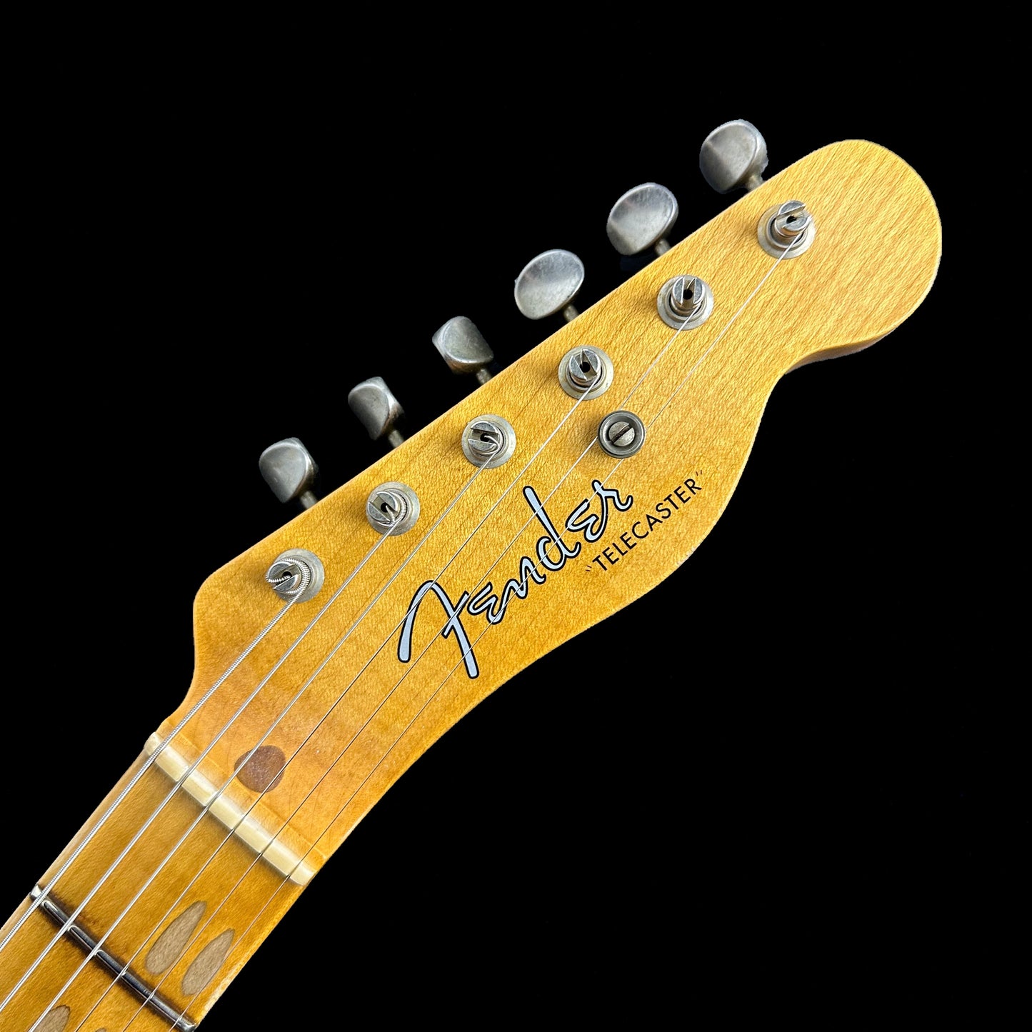 Closeup of Fender Custom Shop 1952 Telecaster Relic Aged Nocaster Blonde headstock.