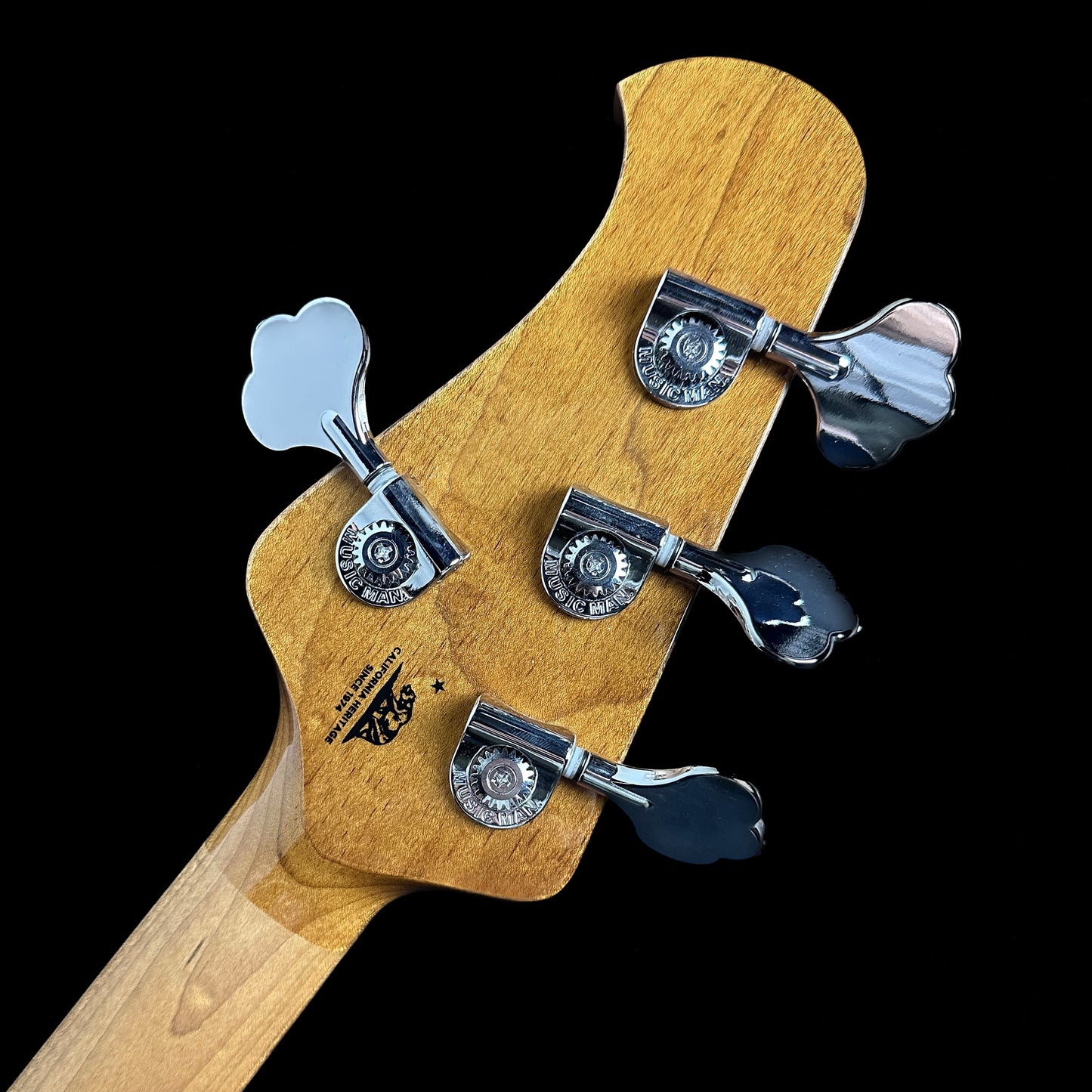 Back of headstock of Ernie Ball Music Man StingRay Special HH Bass MP Snowy Night.