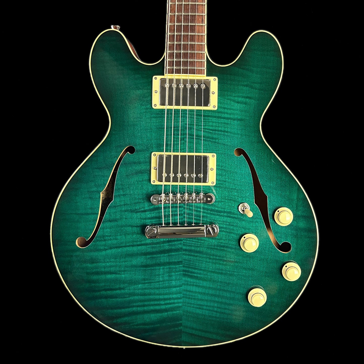 Front of Collings I-35 Deluxe Mermaid Blue Flame Top ThroBaks.