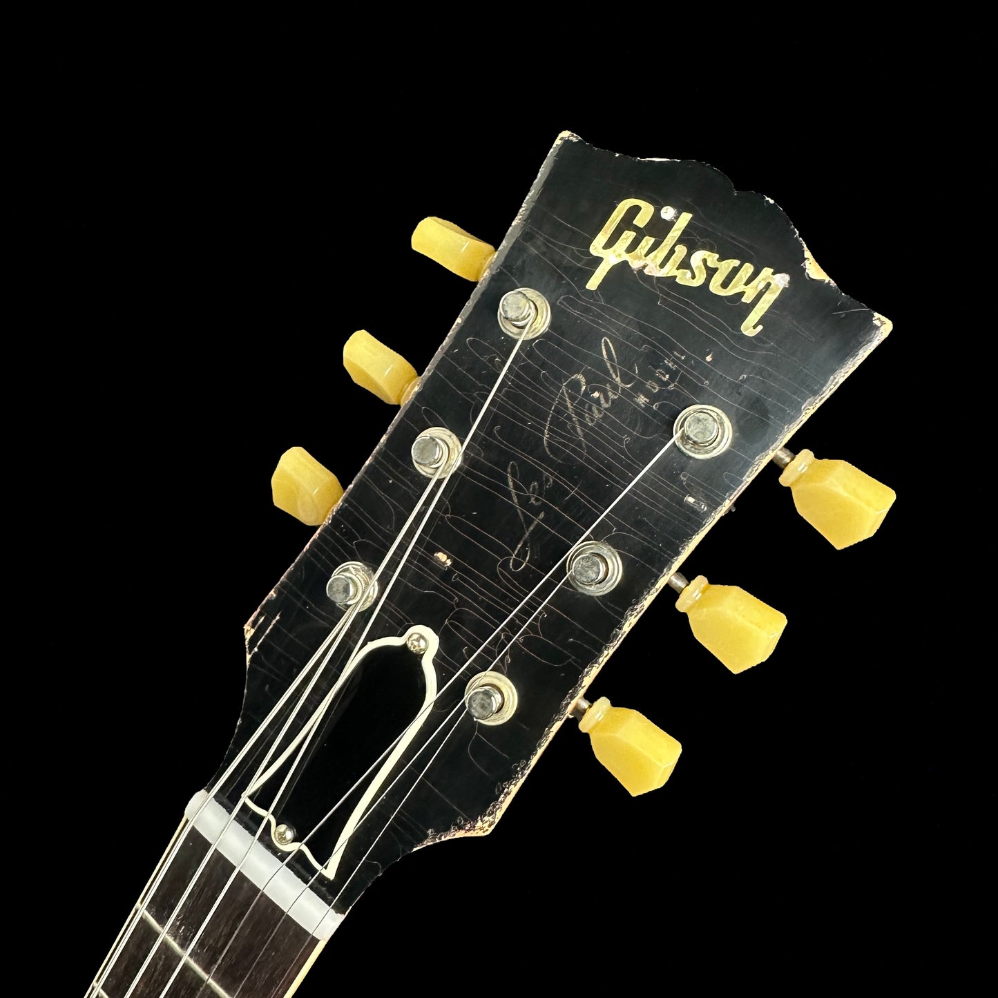 Close up of Gibson Custom Shop Murphy Lab 1959 Les Paul Standard Ultra Heavy Aged Kindred Burst headstock.
