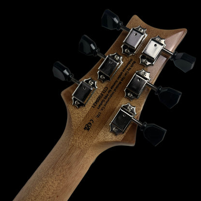 Close up of back of PRS Paul Reed Smith SE Zach Myers 594 Semi-Hollow Myers Blue headstock.