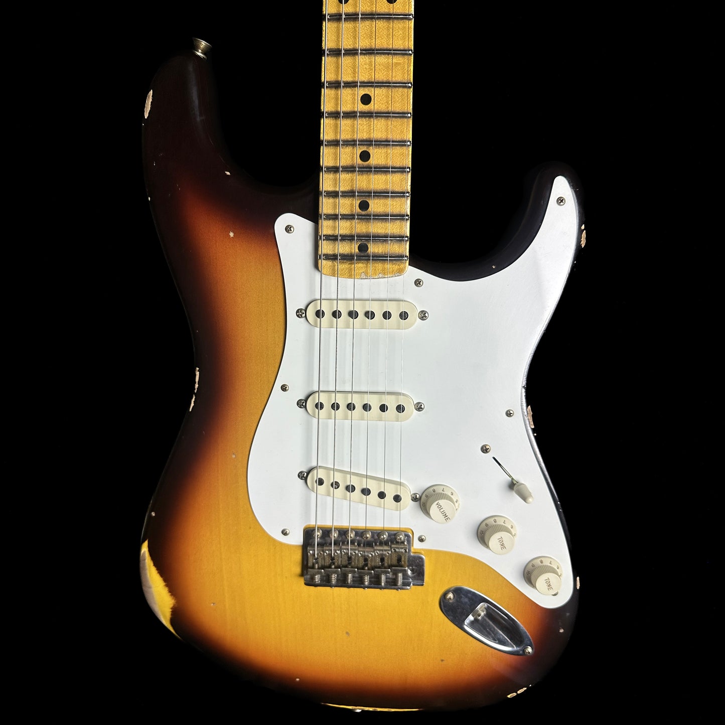 Front of Fender Custom Shop 58 Strat Relic Faded Aged Chocolate 3-color Sunburst.