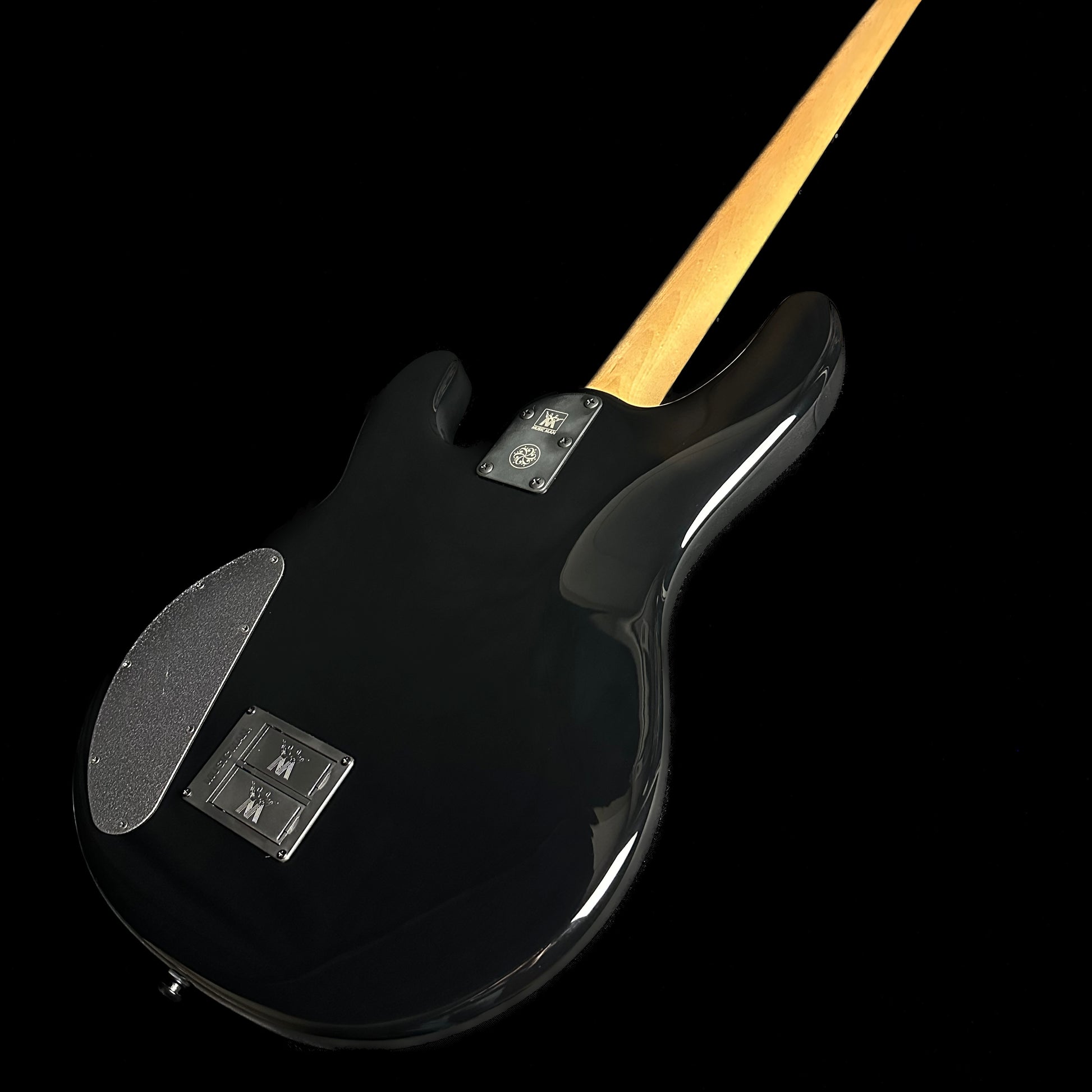 Bottom right angle of Ernie Ball Music Man DarkRay Bass Obsidian Black back.