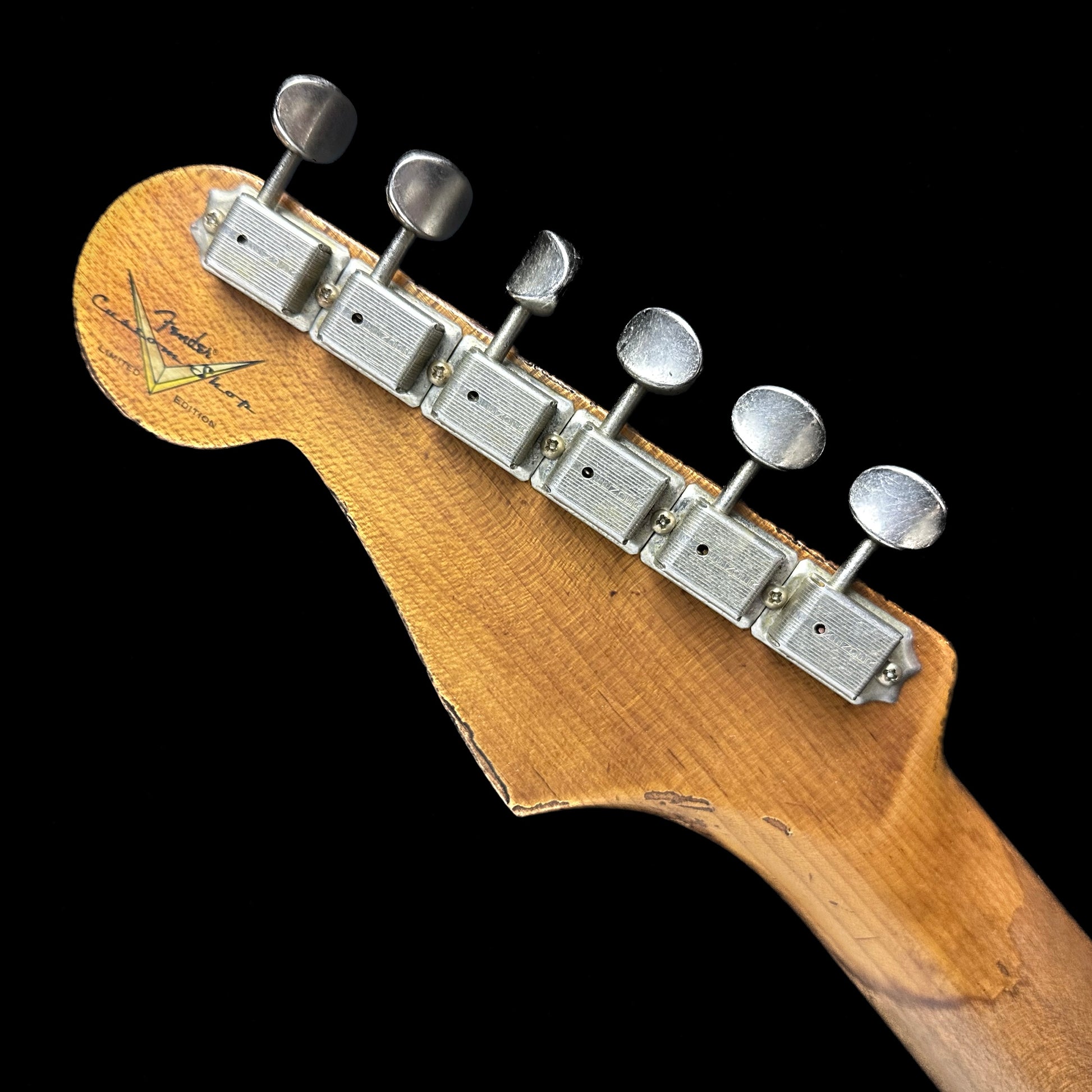 Back of Fender Custom Shop  Limited Edition Roasted 1961 Stratocaster Super Heavy Relic Aged Sherwood Green Metallic/3TSB headstock.