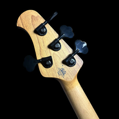 Back of Ernie Ball Music Man DarkRay Bass Obsidian Black headstock.