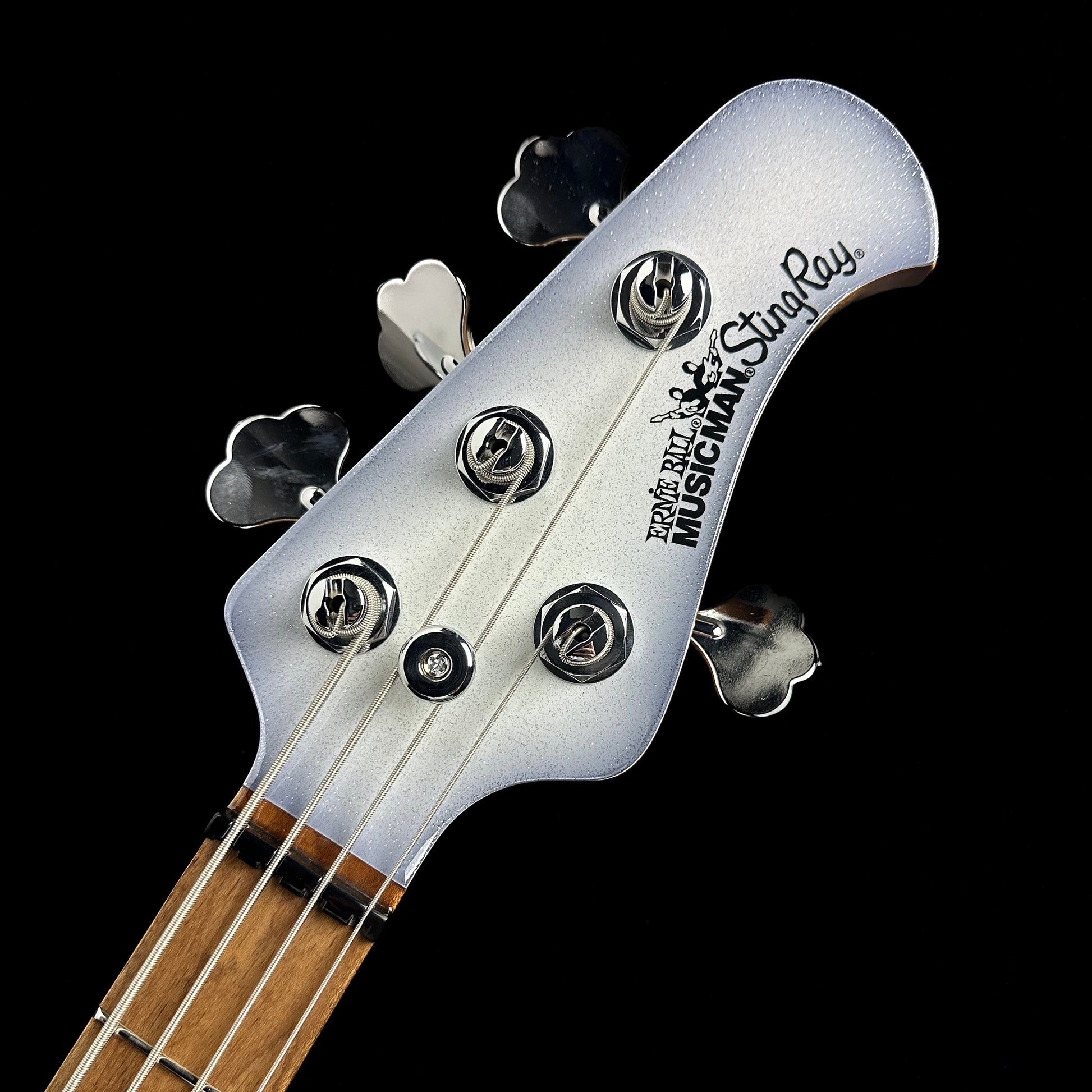 Headstock of Ernie Ball Music Man StingRay Special HH Bass MP Snowy Night.