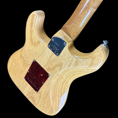 Back angle of Fender Custom Shop American Custom Strat NOS RW Amber Natural.