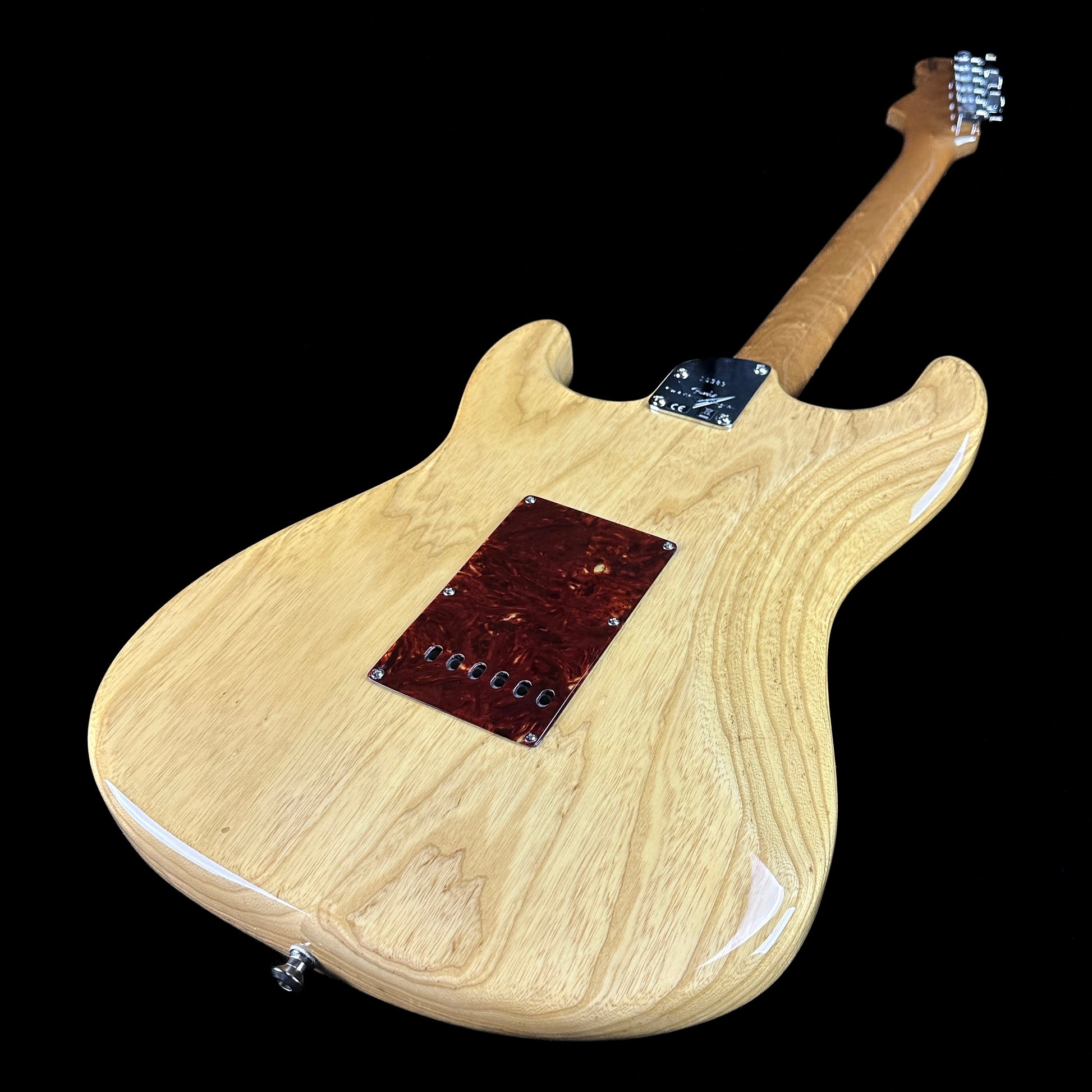 Back angle of Fender Custom Shop American Custom Strat NOS RW Amber Natural.