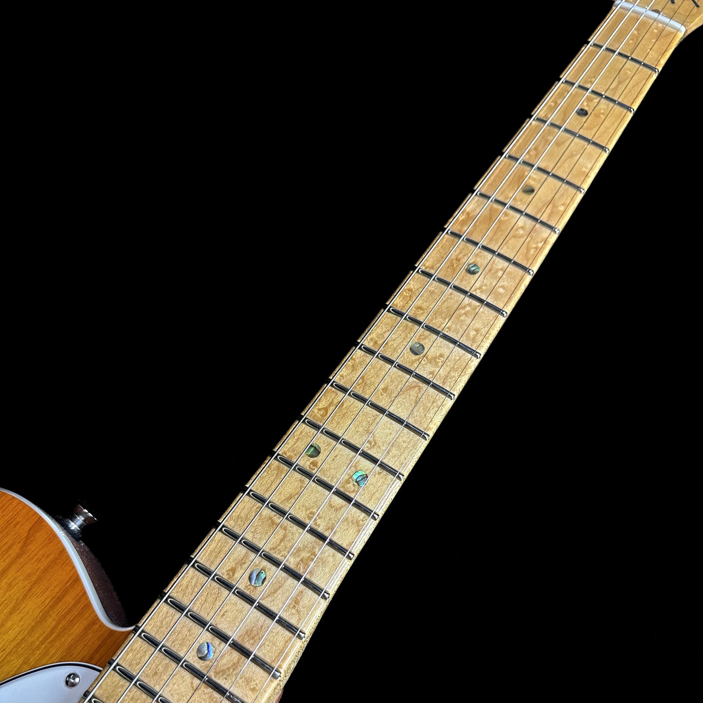 Close up of Fender American Custom Telecaster MP Honey Burst NOS fretboard.