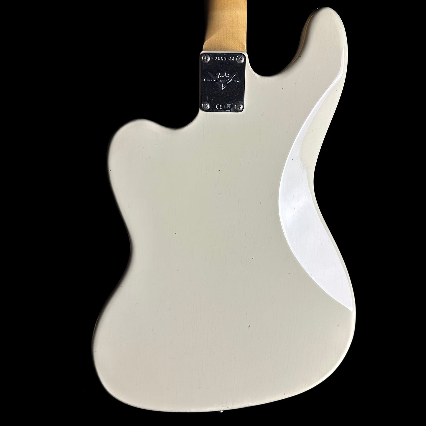 Back of Fender Custom Shop Bass VI Journeyman Relic Vintage White body.