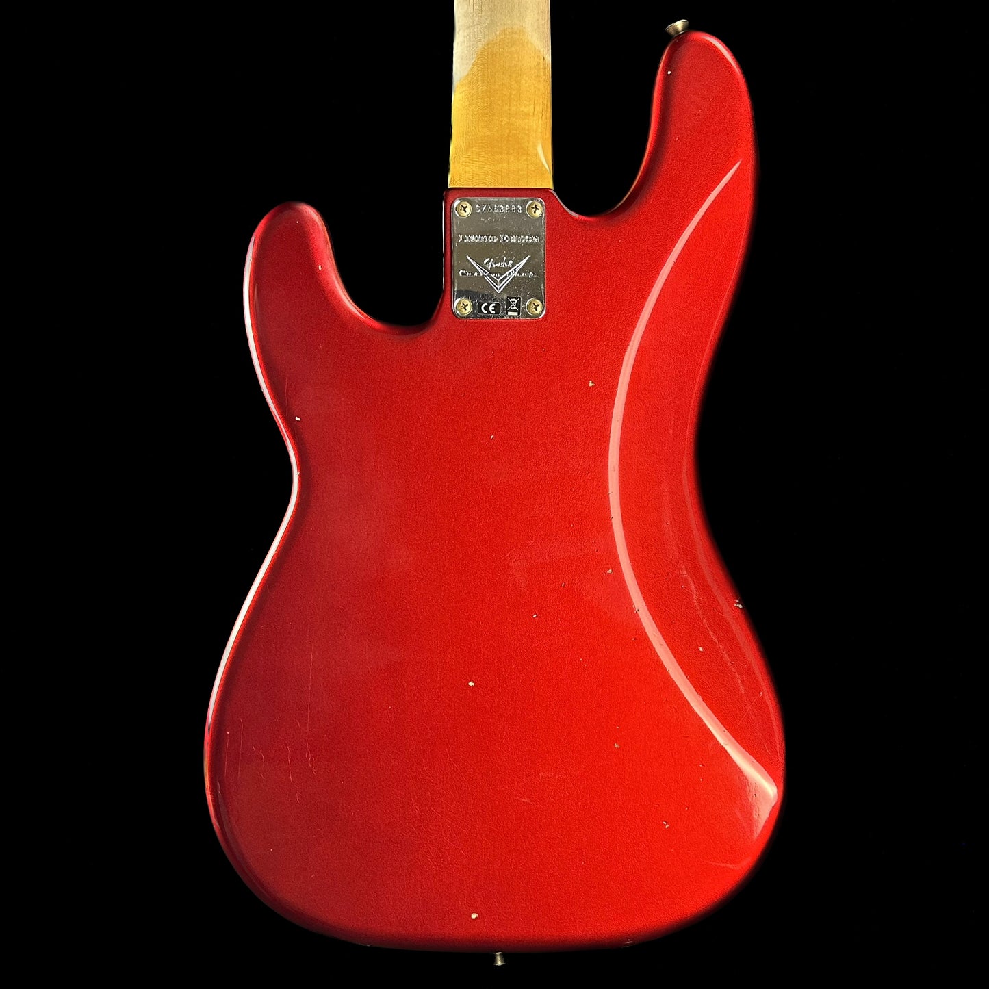 Back of Fender Custom Shop Limited P Jazz Bass Journeyman Aged Candy Apple Red.
