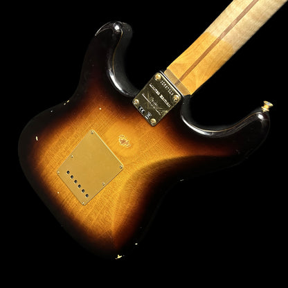 Back angle of Fender Custom Shop Limited Edition '55 "bone-tone" Strat - Relic Wide-Fade 2-color Sunburst.